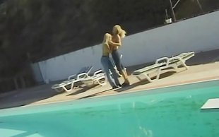 Insanely open minded blonde lets her girlfriend caress her near pool