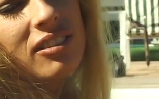 Insanely open minded blonde lets her girlfriend caress her near pool