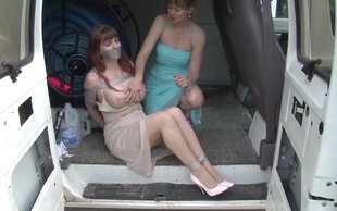 Incredibly busty and sexy babe is getting kidnaped by a lesbian