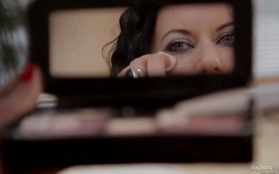 Lovely blonde is kissing her girlfriend's body from head to toe