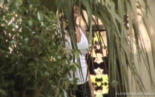 Sweet and passionate blonde is undressing outdoors and masturbating